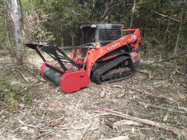 Kubota SVL75-3 with the drum mulcher parked on freshly mulched ground, Rutherford County, TN
